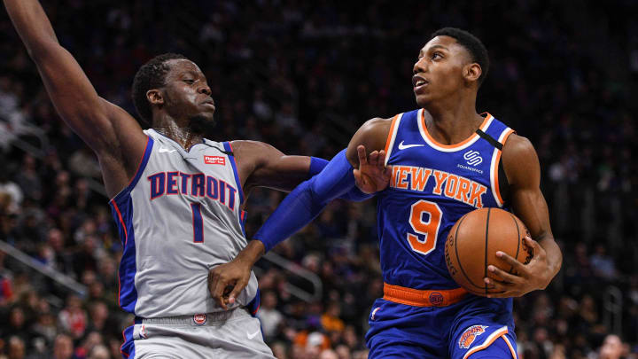 Feb 8, 2020; Detroit, Michigan, USA; New York Knicks guard RJ Barrett (9) goes to the basket as Detroit Pistons guard Reggie Jackson (1) defends during the fourth quarter at Little Caesars Arena. Mandatory Credit: Tim Fuller-USA TODAY Sports