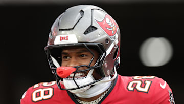 Aug 9, 2025; Tampa, Florida, USA; Tampa Bay Buccaneers safety Shilo Sanders (28) takes the field for warmups before a preseason game against the Tennessee Titans at Raymond James Stadium. Mandatory Credit: Nathan Ray Seebeck-Imagn Images