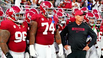 Sep 28, 2024; Tuscaloosa, Alabama, USA; Alabama Crimson Tide head coach Kalen DeBoer leads his team onto the field before the game against the Georgia Bulldogs at Bryant-Denny Stadium. Mandatory Credit: John David Mercer-Imagn Images