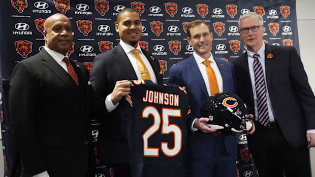 Chicago Bears (R-L) President Kevin Warren, general manager Ryan Poles, new head coach Ben Johnson and chairman George McCask