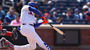 Apr 20, 2025; New York City, New York, USA; New York Mets right fielder Juan Soto (22) singles during the fifth inning against the St. Louis Cardinals at Citi Field. Mandatory Credit: Vincent Carchietta-Imagn Images