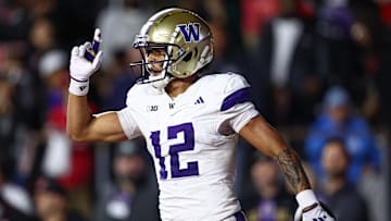 Sep 27, 2024; Piscataway, New Jersey, USA; Washington Huskies wide receiver Denzel Boston (12) celebrates his touchdown during the second half against the Rutgers Scarlet Knights at SHI Stadium. Mandatory Credit: Vincent Carchietta-Imagn Images