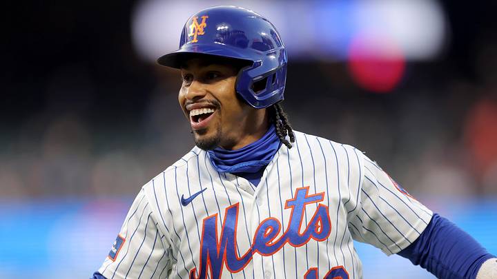 Apr 22, 2026; New York City, New York, USA; New York Mets shortstop Francisco Lindor (12) reacts after his RBI infield single against the Minnesota Twins during the first inning at Citi Field. Mandatory Credit: Brad Penner-Imagn Images