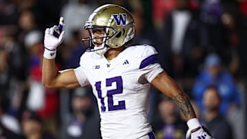 Sep 27, 2024; Piscataway, New Jersey, USA; Washington Huskies wide receiver Denzel Boston (12) celebrates his touchdown during the second half against the Rutgers Scarlet Knights at SHI Stadium. Mandatory Credit: Vincent Carchietta-Imagn Images