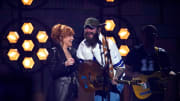 Reba McEntire and Post Malone perform a tribute to the late Dickey Betts at the 59th ACM Awards at