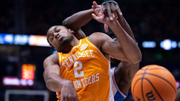 Tennessee guard Chaz Lanier (2) is denied on his shot attempt by Florida center Rueben Chinyelu (9) Nashville, Tenn., Sunday, March 16, 2025.