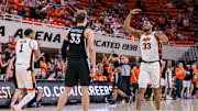 Feb 25, 2025; Stillwater, Oklahoma, USA; Oklahoma State Cowboys forward Abou Ousmane (33) reacts after a play during the second half against the Iowa State Cyclones at Gallagher-Iba Arena. Mandatory Credit: William Purnell-Imagn Images