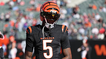 Nov 23, 2025; Cincinnati, Ohio, USA; Cincinnati Bengals wide receiver Tee Higgins (5) warms up before a game against the New England Patriots at Paycor Stadium. Mandatory Credit: Joseph Maiorana-Imagn Images