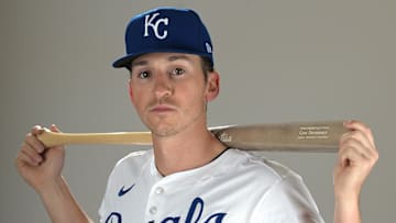 Feb 19, 2025; Surprise, AZ, USA; Kansas City Royals Cam Devanney (99) poses for a photo during media day. Mandatory Credit: Jayne Kamin-Oncea-Imagn Images  