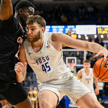 South Dakota State Jackrabbits center Oscar Cluff (45) posts up 