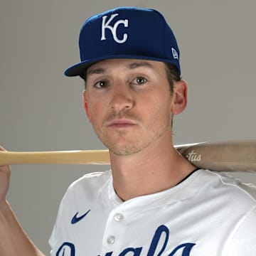 Feb 19, 2025; Surprise, AZ, USA; Kansas City Royals Cam Devanney (99) poses for a photo during media day. Mandatory Credit: Jayne Kamin-Oncea-Imagn Images  