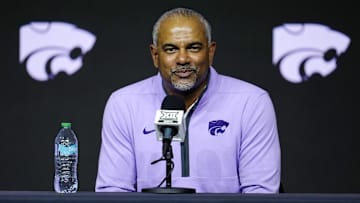 Oct 23, 2024; Kansas City, MO, USA; Kansas State Wildcats head coach Jerome Tang talks to media during the Big 12 Men’s Basketball Media Day at T-Mobile Center. Mandatory Credit: Jay Biggerstaff-Imagn Images