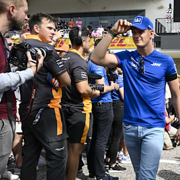 Oct 23, 2022; Austin, Texas, USA; Haas F1 Team driver Mick Schumacher (47) of Team Germany walks on to the track before the running of the U.S. Grand Prix F1 race at Circuit of the Americas. Mandatory Credit: Jerome Miron-Imagn Images