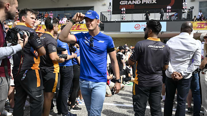 Oct 23, 2022; Austin, Texas, USA; Haas F1 Team driver Mick Schumacher (47) of Team Germany walks on to the track before the running of the U.S. Grand Prix F1 race at Circuit of the Americas. Mandatory Credit: Jerome Miron-Imagn Images