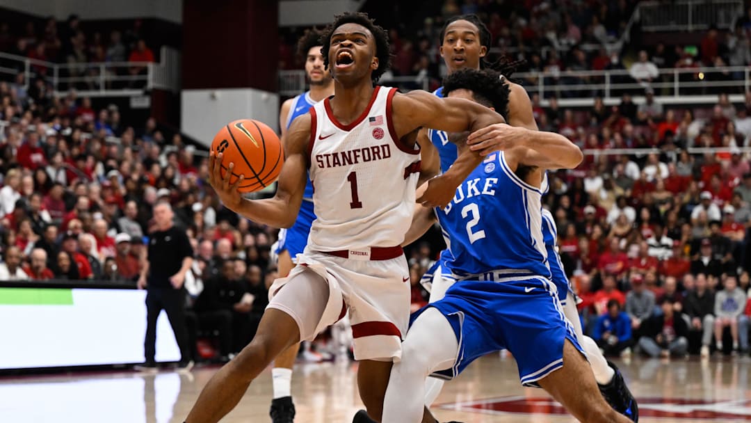 Jan 17, 2026; Stanford, California, USA; Stanford Cardinal guard Ebuka Okorie (1) gets fouled by Duke Blue Devils guard Cayden Boozer (2) in the first half at Maples Pavilion. Mandatory Credit: Eakin Howard-Imagn Images