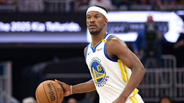 Apr 13, 2025; San Francisco, California, USA; Golden State Warriors forward Jimmy Butler III (10) controls the ball against the LA Clippers during the first quarter at Chase Center. Mandatory Credit: Robert Edwards-Imagn Images
