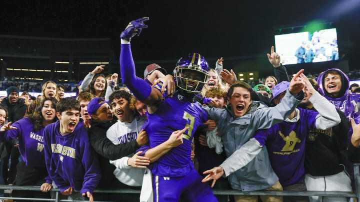 Oct 21, 2023; Seattle, Washington, USA; Washington Huskies safety Mishael Powell (3) celebrates with fans in the student section following a 15-7 victory against the Arizona State Sun Devils at Alaska Airlines Field at Husky Stadium. Mandatory Credit: Joe Nicholson-USA TODAY Sports