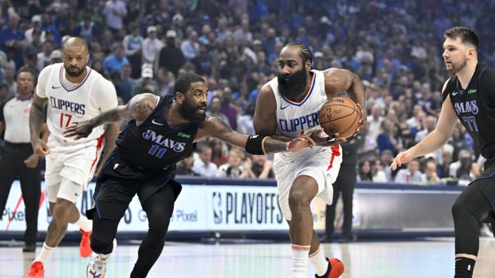 May 3, 2024; Dallas, Texas, USA; LA Clippers guard James Harden (1) drives to the basket past Dallas Mavericks guard Kyrie Irving (11) during the first quarter during game six of the first round for the 2024 NBA playoffs at American Airlines Center. Mandatory Credit: Jerome Miron-USA TODAY Sports