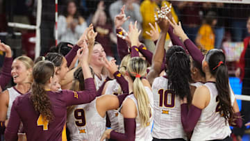 The ASU volleyball team celebrates its 3-1 win over the Cincinnati Bearcats at Desert Financial Arena on Nov. 26, 2025.