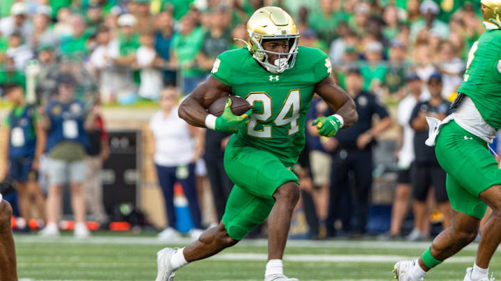 Oct 4, 2025; South Bend, Indiana, USA; Notre Dame Fighting Irish running back Jadarian Price (24) runs for a touchdown against the Boise State Broncos during the second half at Notre Dame Stadium. Mandatory Credit: Michael Caterina-Imagn Images