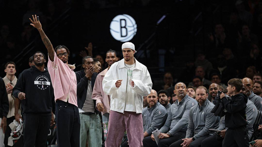 Apr 5, 2026; Brooklyn, New York, USA; Brooklyn Nets center Nic Claxton (33), left, and forward Michael Porter Jr. (17) celebrate after a Nets basket during the second half against the Washington Wizards at Barclays Center. Mandatory Credit: Vincent Carchietta-Imagn Images