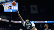La Familia's Eric Bledsoe (12) goes for a layup during their game against the 305 Ballers on Friday, July 19, 2024 in Lexington, Ky. at Rupp Arena during the first round of The Basketball Tournament.