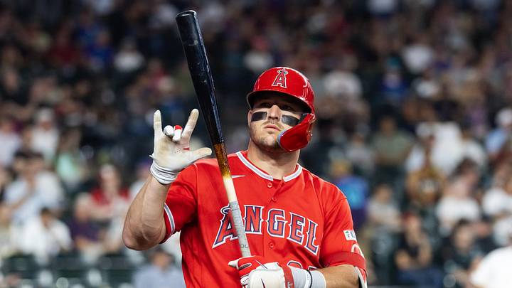 Jun 15, 2026; Phoenix, Arizona, USA; Los Angeles Angels outfielder Mike Trout gestures to a fan against the Arizona Diamondbacks in the first inning at Chase Field. Mandatory Credit: Mark J. Rebilas-Imagn Images