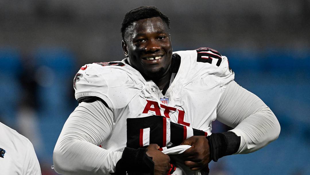Oct 13, 2024; Charlotte, North Carolina, USA; Atlanta Falcons defensive tackle Ruke Orhorhoro (98) walks off the field after the game at Bank of America Stadium. Mandatory Credit: Bob Donnan-Imagn Images