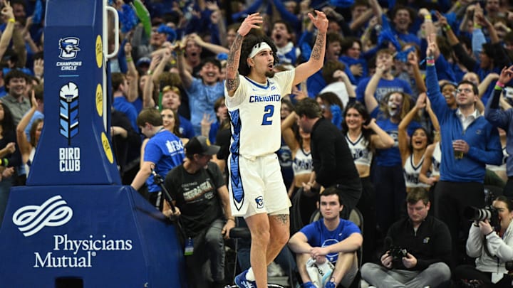 Dec 4, 2024; Omaha, Nebraska, USA; Creighton Bluejays guard Pop Isaacs (2) reacts to the crowd after making a three point basket against the Kansas Jayhawks during the second half at CHI Health Center Omaha. Mandatory Credit: Steven Branscombe-Imagn Images
