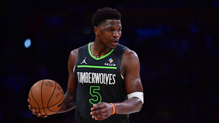 Apr 30, 2025; Los Angeles, California, USA; Minnesota Timberwolves guard Anthony Edwards (5) moves the ball against the Los Angeles Lakers during the second half in game five of first round for the 2025 NBA Playoffs at Crypto.com Arena. Mandatory Credit: Gary A. Vasquez-Imagn Images