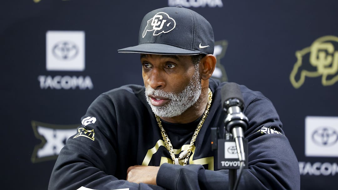 Apr 4, 2025; Boulder, CO, USA; Colorado Buffaloes head coach Deion Sanders speaks to the media at the University of Colorado NFL Showcase at the CU Indoor Practice Facility. Mandatory Credit: Michael Ciaglo-Imagn Images