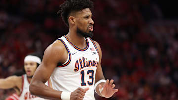 Mar 17, 2024; Minneapolis, MN, USA; Illinois Fighting Illini forward Quincy Guerrier (13) reacts in