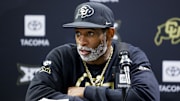 Apr 4, 2025; Boulder, CO, USA; Colorado Buffaloes head coach Deion Sanders speaks to the media at the University of Colorado NFL Showcase at the CU Indoor Practice Facility. Mandatory Credit: Michael Ciaglo-Imagn Images