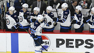 Apr 12, 2025; Chicago, Illinois, USA;   Winnipeg Jets right wing Nino Niederreiter (62) celebrates with teammates afters scoring against the Chicago Blackhawks during the second period at United Center. Mandatory Credit: Matt Marton-Imagn Images