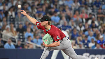 Jun 17, 2025; Toronto, Ontario, CAN;  Arizona Diamondbacks relief pitcher Shelby Miller (18) delivers a pitch against the Toronto Blue Jays in the ninth inning at Rogers Centre. Mandatory Credit: Dan Hamilton-Imagn Images