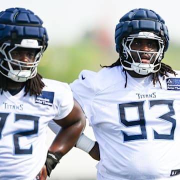 Tennessee Titans defensive tackle T'Vondre Sweat goes through drills during training camp. Mandatory Credit: Steve Roberts-Imagn Images