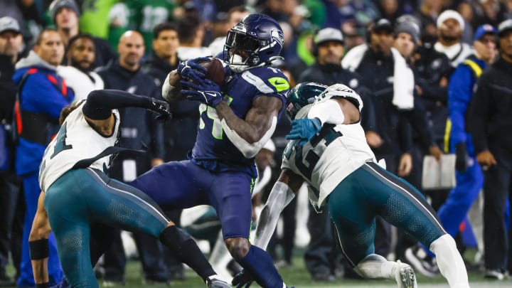 Dec 18, 2023; Seattle, Washington, USA; Seattle Seahawks wide receiver DK Metcalf (14) catches a pass against the Philadelphia Eagles during the fourth quarter at Lumen Field. Mandatory Credit: Joe Nicholson-USA TODAY Sports