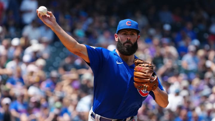 Aug 5, 2021; Denver, Colorado, USA; Chicago Cubs starting pitcher Jake Arrieta (49) throws to first base against the Colorado Rockies in the first inning at Coors Field. 