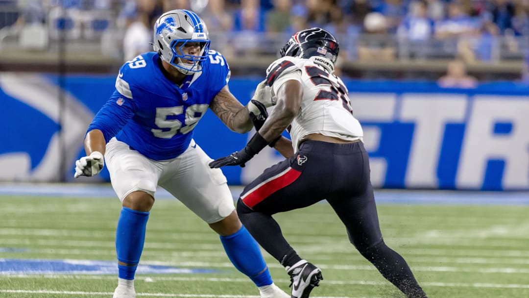 Aug 23, 2025; Detroit, Michigan, USA; Detroit Lions offensive tackle Giovanni Manu (59) defends against Houston Texans defensive end Solomon Byrd (50) during the second half at Ford Field.