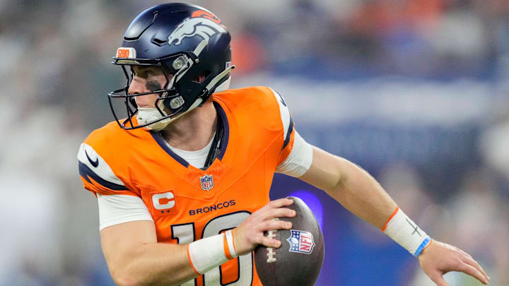 Denver Broncos quarterback Bo Nix (10) scrambles with the bal Sunday, Sept. 14, 2025, during a game against the Indianapolis Colts at Lucas Oil Stadium in Indianapolis. Denver Broncos quarterback Bo Nix (10) scrambles with the bal Sunday, Sept. 14, 2025, during a game against the Indianapolis Colts at Lucas Oil Stadium in Indianapolis.