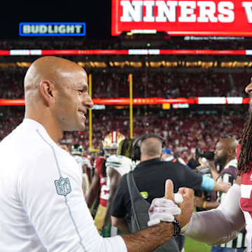 Sep 9, 2024; Santa Clara, California, USA; New York Jets head coach Robert Saleh (left) greets San Francisco 49ers linebacker Fred Warner (right) after the game at Levi's Stadium. Mandatory Credit: Darren Yamashita-Imagn Images