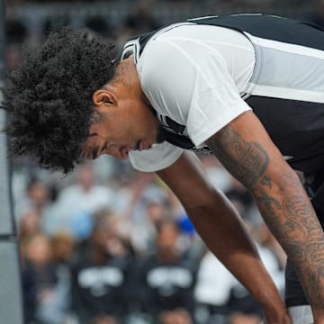 Oct 27, 2025; San Antonio, Texas, USA; San Antonio Spurs guard Dylan Harper (2) recovers in the first half against the Toronto Raptors at Frost Bank Center.