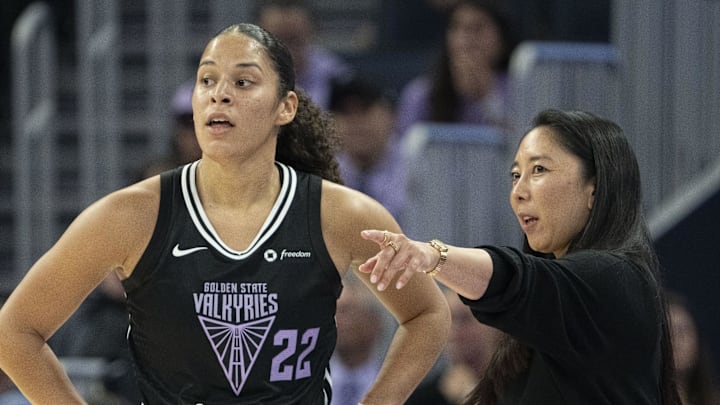 May 6, 2025; San Francisco, CA, USA; Golden State Valkyries head coach Natalie Nakase (right) instructs guard Veronica Burton (22) during the second quarter against the Los Angeles Sparks at Chase Center. Mandatory Credit: Kyle Terada-Imagn Images