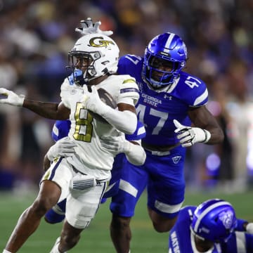 Aug 31, 2024; Atlanta, Georgia, USA; Georgia Tech Yellow Jackets wide receiver Malik Rutherford (8) runs after a catch against Georgia State Panthers in the third quarter at Bobby Dodd Stadium at Hyundai Field. Mandatory Credit: Brett Davis-USA TODAY Sports
