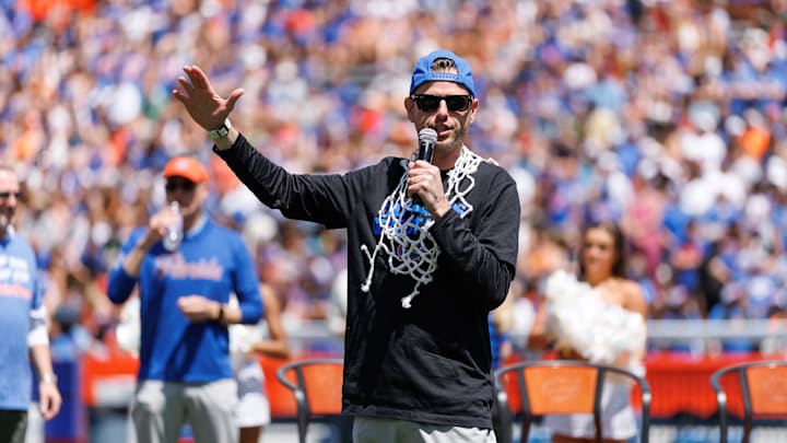 Apr 12, 2025; Gainesville, FL, USA; Florida Gators head coach Todd Golden gestures while speaking to the crowd during the National Championship celebration at Ben Hill Griffin Stadium. Mandatory Credit: Matt Pendleton-Imagn Images