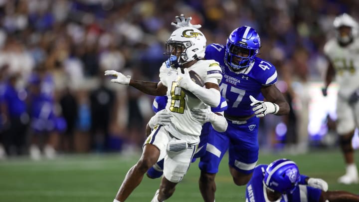 Aug 31, 2024; Atlanta, Georgia, USA; Georgia Tech Yellow Jackets wide receiver Malik Rutherford (8) runs after a catch against Georgia State Panthers in the third quarter at Bobby Dodd Stadium at Hyundai Field. Mandatory Credit: Brett Davis-USA TODAY Sports