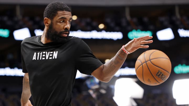 Jun 14, 2024; Dallas, Texas, USA; Dallas Mavericks guard Kyrie Irving (11) warms up before game four of the 2024 NBA Finals 