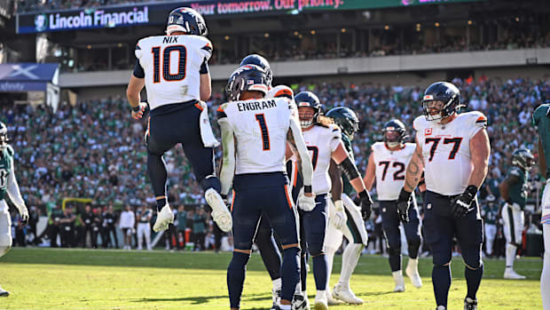 Denver Broncos quarterback Bo Nix (10) and Denver Broncos tight end Evan Engram (1) celebrate touchdown.
