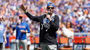 Apr 12, 2025; Gainesville, FL, USA; Florida Gators head coach Todd Golden gestures while speaking to the crowd during the National Championship celebration at Ben Hill Griffin Stadium. Mandatory Credit: Matt Pendleton-Imagn Images