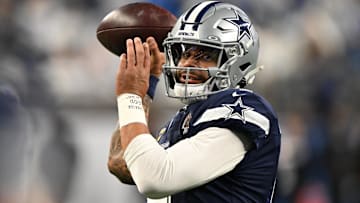Dallas Cowboys quarterback Dak Prescott warms up before a game against the Detroit Lions at Ford Field.
